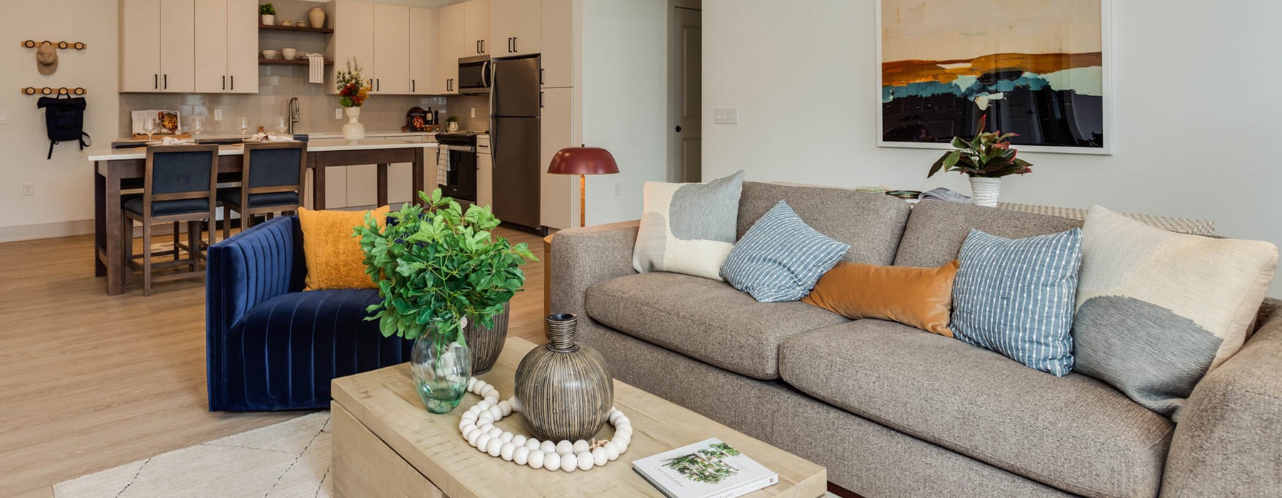 living room with couch coffee table and view of kitchen